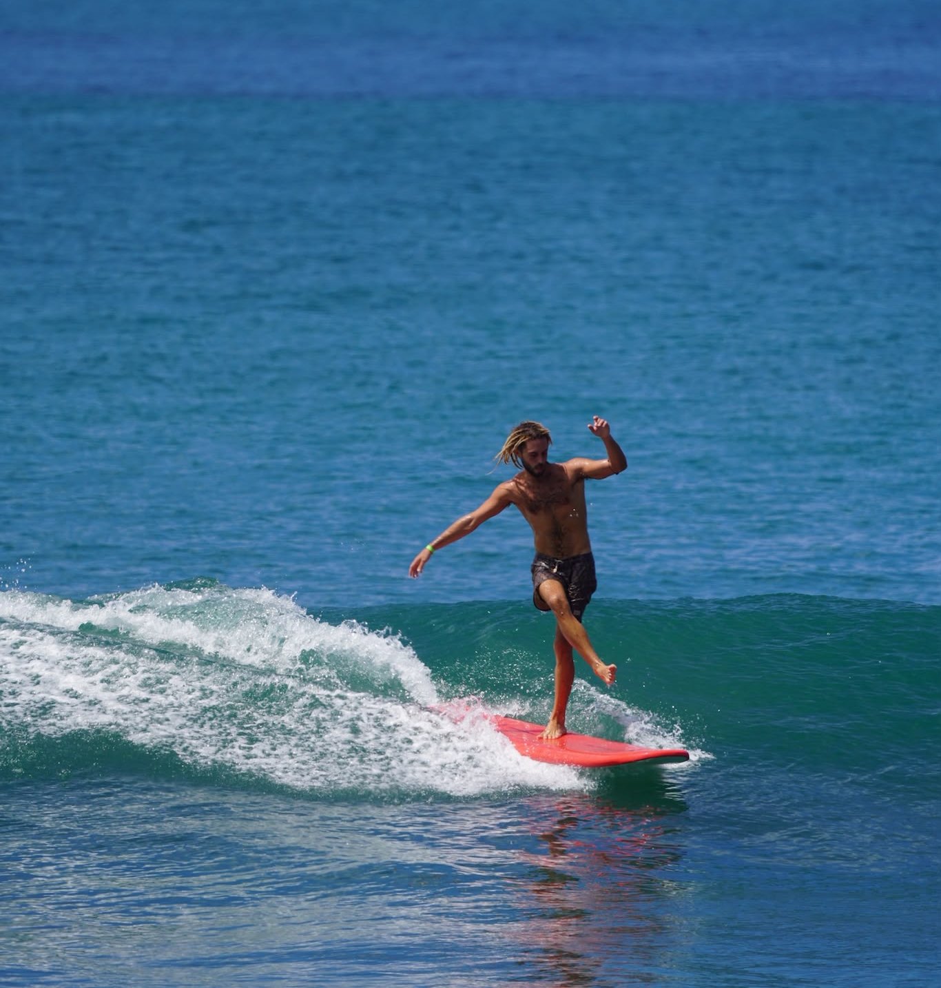 Dylan surfing a wave at Playa Venao, Panama